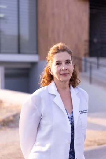Dr. Elena Reyes